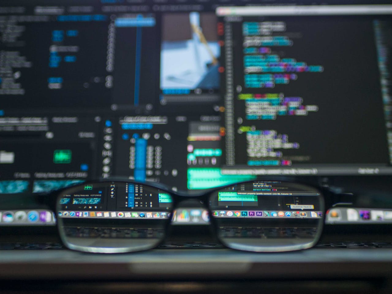 Crafting Captivating Headlines: Your awesome post title goes here Eyeglasses reflecting computer code on a monitor, ideal for technology and programming themes.